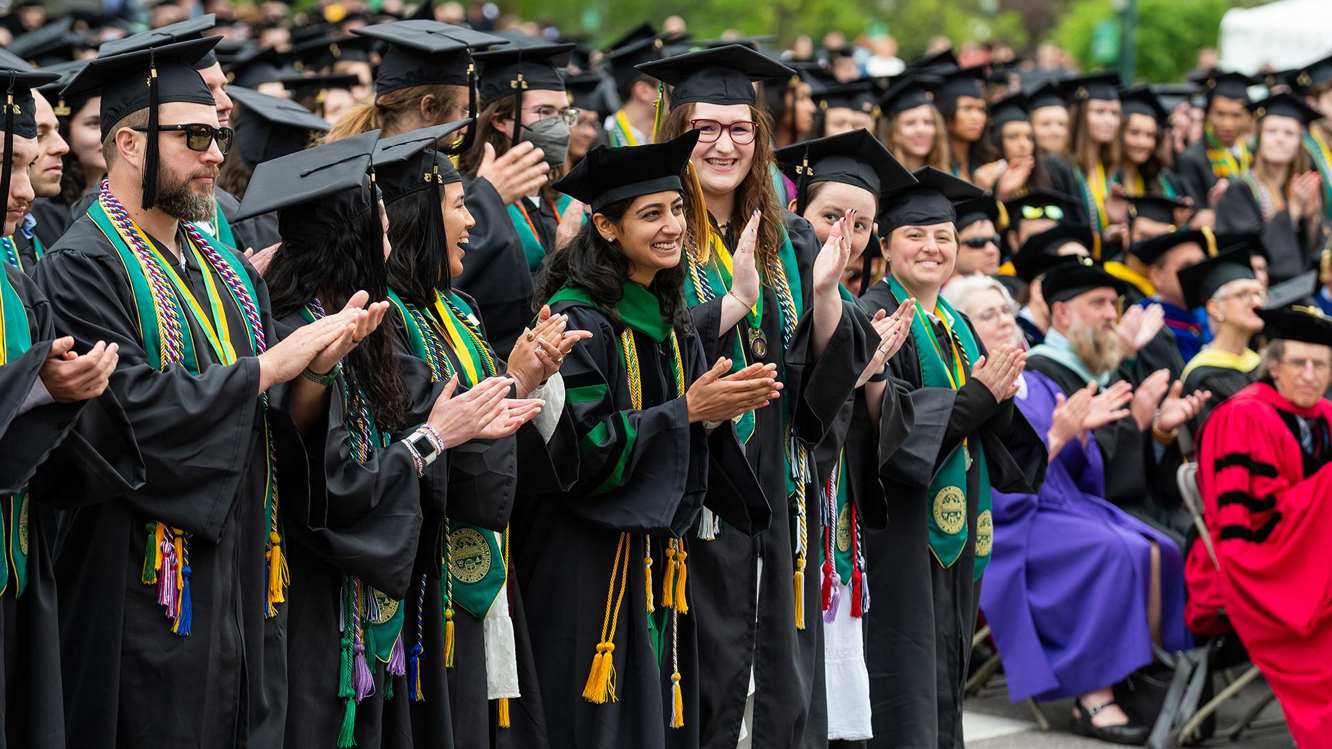 group of happy students at main commencement ceremony