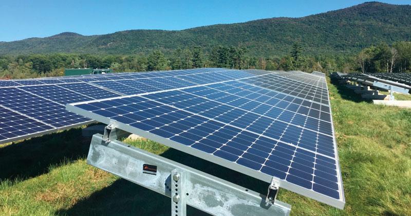 A solar panel array located in the green mountains of Vermont