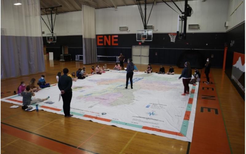 Students doing an exercise with the Giant Map