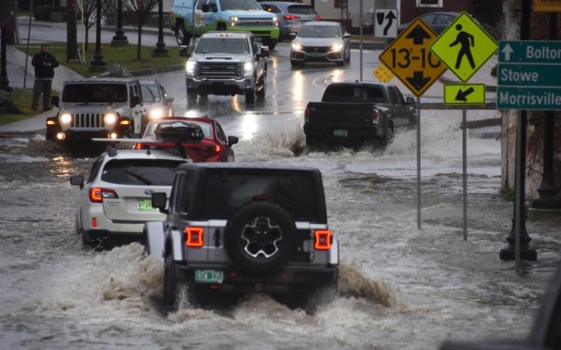 December 2023 Flooding at the Waterbury Roundabout by Gordon Miller Cars driving through flooded roads