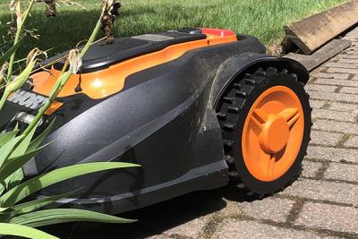 Mo, the robotic lawnmower stuck in a plant