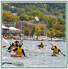 Icon graphic showing kayakers in Lake Champlain