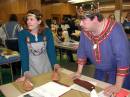 Northern Lights A&S Pentathlon   Madeline and Cenwulf examine her Viking shoes.  