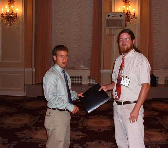 Dan Elmowitz receiving award