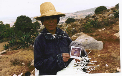 Picture of a Woman Making Straw Hats