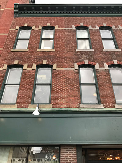 Building infill beween Howard Opera House and 157 Bank Street.