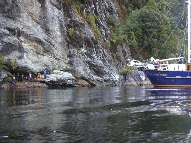 Closeup of two groups and boat