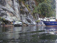 Closeup of two groups and boat