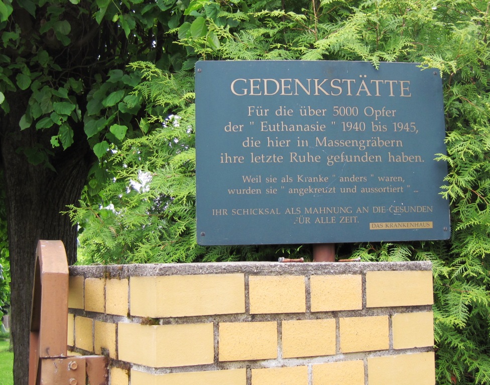 sign at the entrance of cemetery