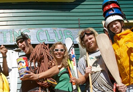 a group of students ham it up from the outing club