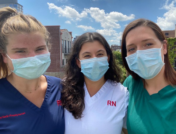 three nursing alumni wearing masks