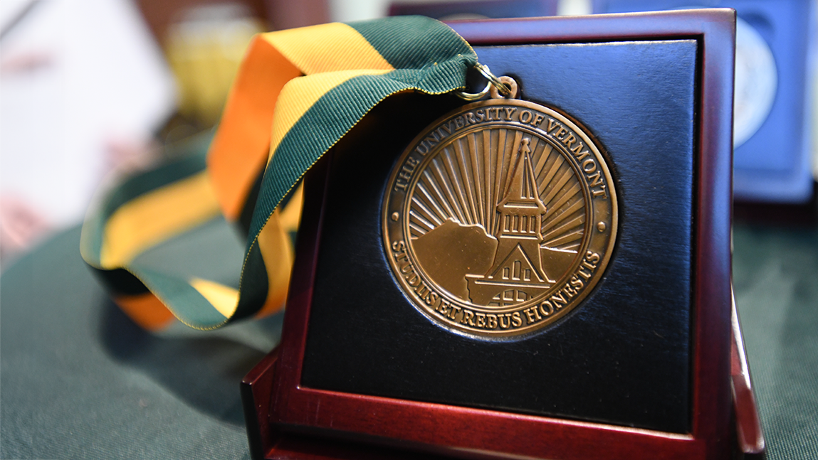 Close-up of the medallion presented to endowed professors and chairs at UVM.