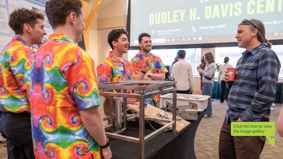 Mechanical Engineering students Matt Weir, Alex Runnals, Brody Lustberg, and Jacob Gruskay discuss their SEED project with Professor William Louisos