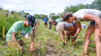 SI-MBA students working outside at the Intervale