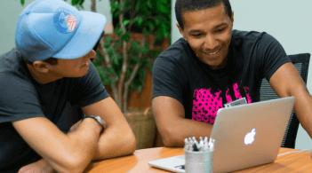 Two students studying together at a table