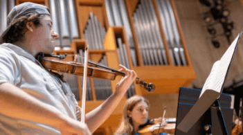 Student playing a violin
