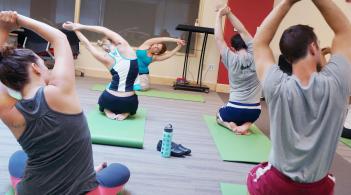 Students doing yoga as part of a Wellness Activity. 