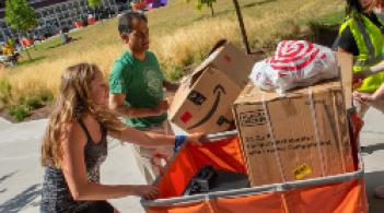 people moving boxes
