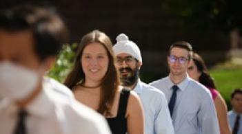 group of med students walking in line
