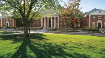 A wide-angle shot of the Waterman Building and Waterman Green on a beautiful day.