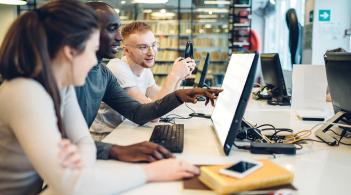 Students collaborating in the Library