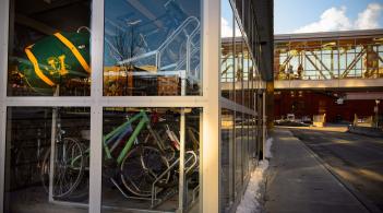 Bike storage racks behind a window