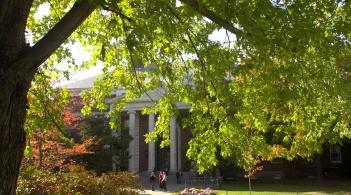 View of Waterman building through the trees