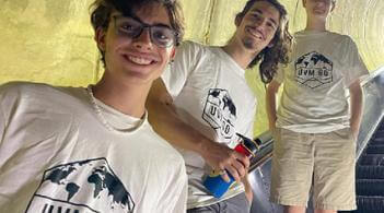 3 people smiling