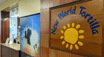 Photo of New World Tortilla sign in the UVM Marketplace 