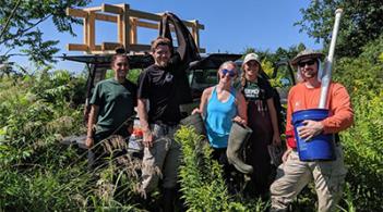 Student researchers in the field