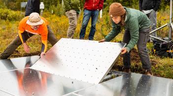 CEMS Students installing field equipment for snow pack research