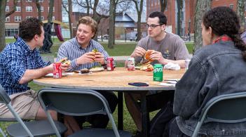 CEMS graduate students enjoy a catered lunch on the green