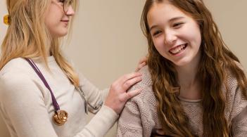 Student preforming a basic check up