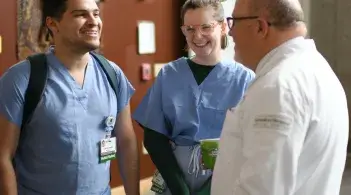 Surgeon talking with medical students