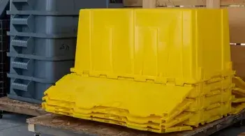 large plastic containers, stacked