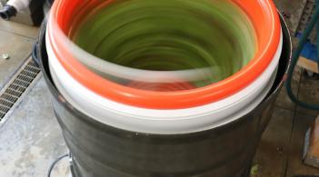 a greens spinner in motion