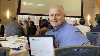 Alan chant with award
