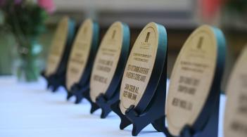 Award plates on table