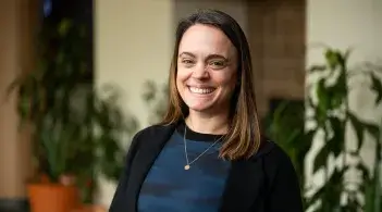 a young nursing professor smiles