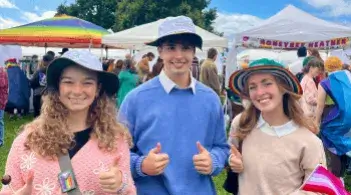 Group wearing bucket hats on a sunny day