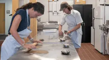 Researchers working in kitchen