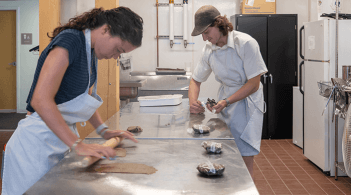 Researchers working in kitchen