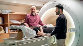 Associate Professor Nic Fiorentino works with graduate students on cartilage biomechanics research.