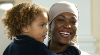 mother and child laughing