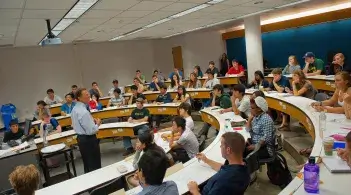 lecture hall with students and professor