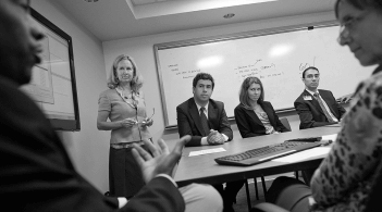 a room full of people presenting