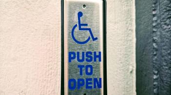Close-up of an automated door opener button