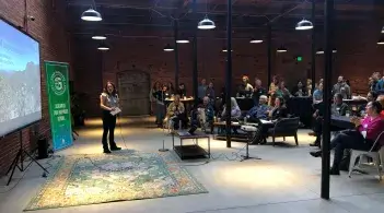 A person addresses a crowd