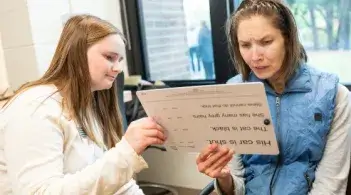 Occupational therapy student with client in the smart apartment