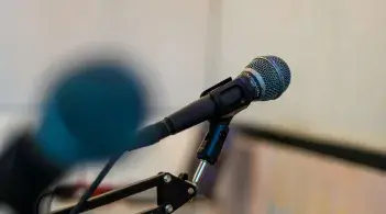 a microphone at a lecture hall podium